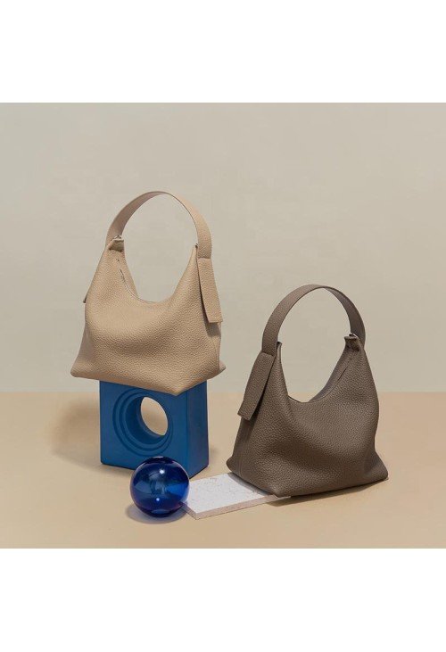 Half-moon shape soft pebbled leather handbag