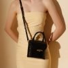 Women's crocodile textured leather shoulder bag